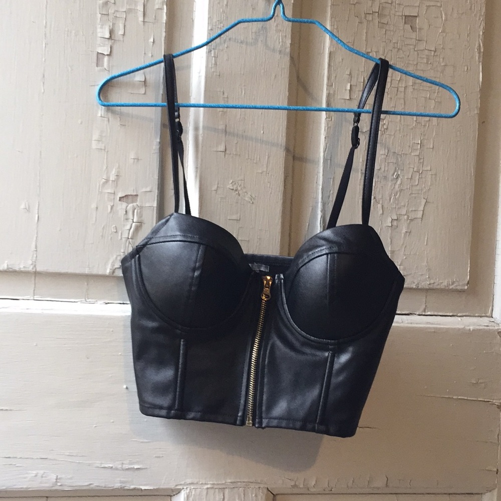 Black faux leather, zip up top. XS, polyester